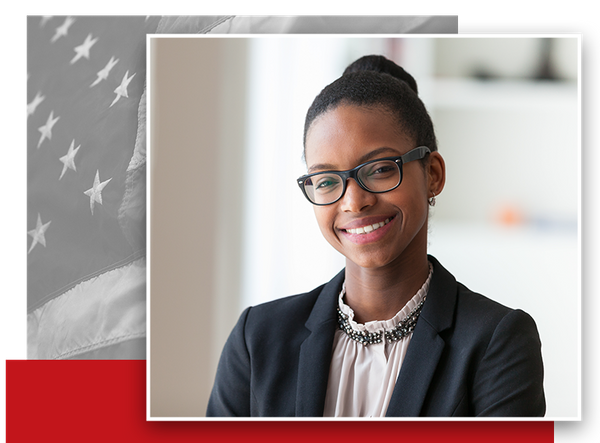 African American woman in suit and glasses