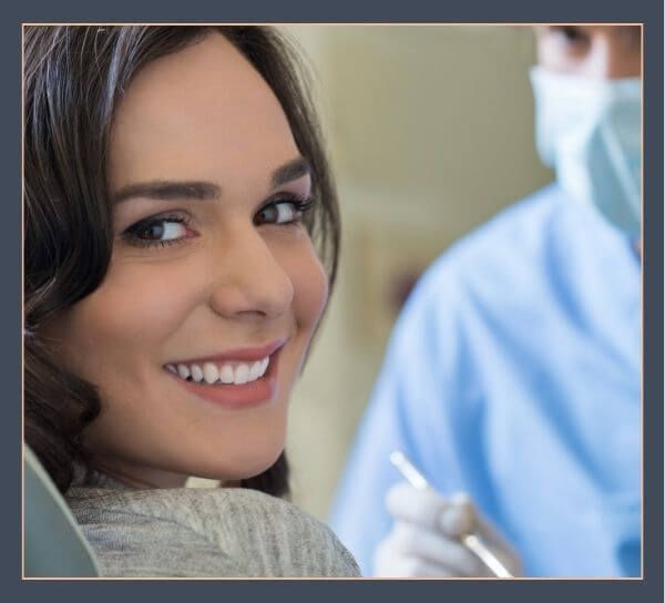 smiling woman with dentist