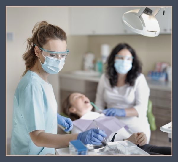 dentist performing emergency dental work