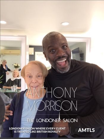Anthony Morrison standing next to and smiling with an older woman at THE LONDONER's Hermosa Beach hair salon.