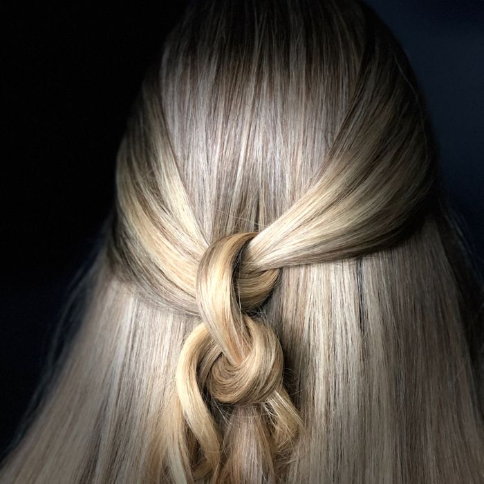 Blonde hair styled in a braid at THE LONDONER hair salon in Hermosa Beach.