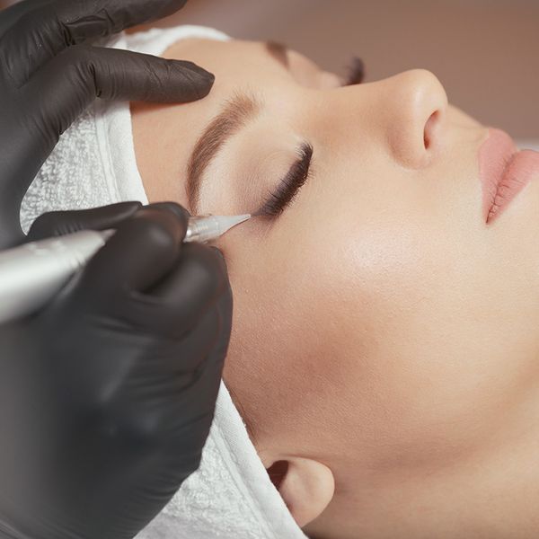 Woman getting medispa service treatment