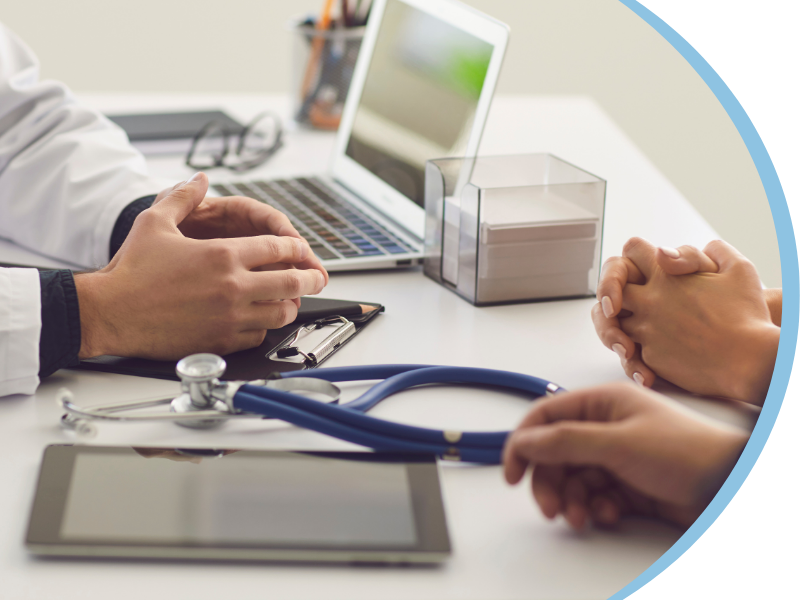 Couple talking with a doctor