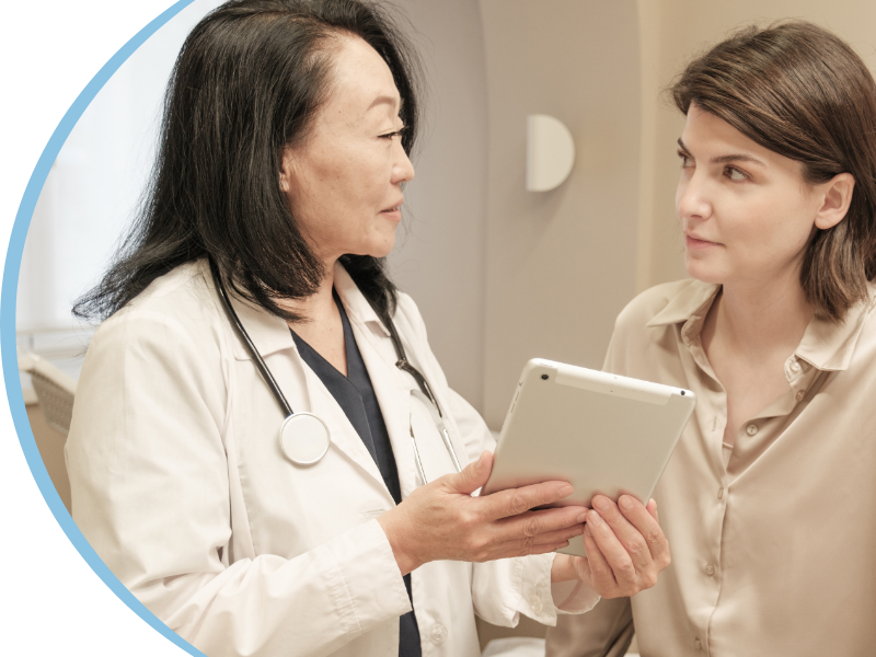 Doctor talking with a female patient