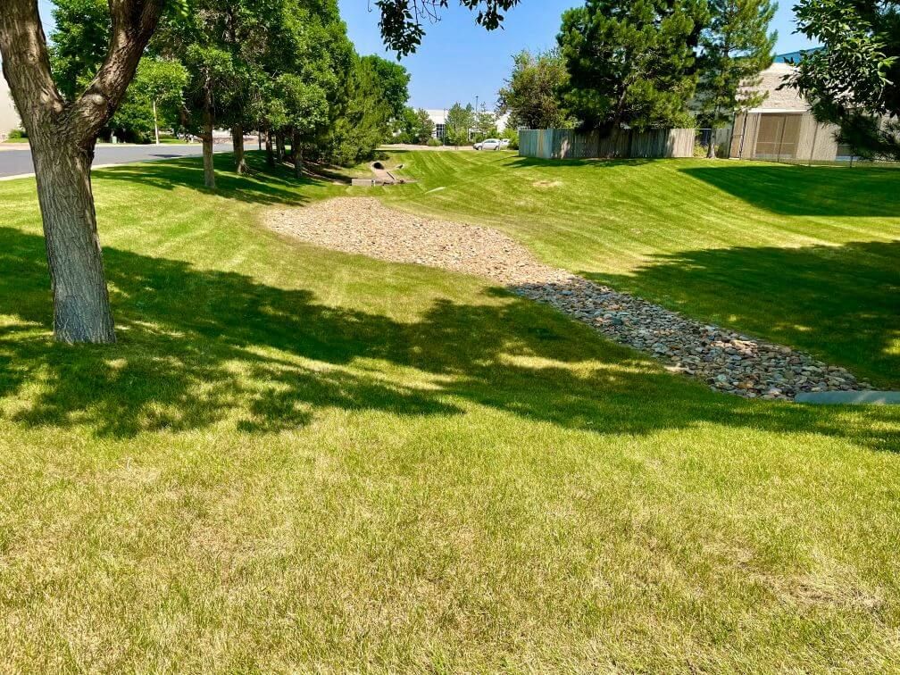 a large well cut commercial lawn on a hill