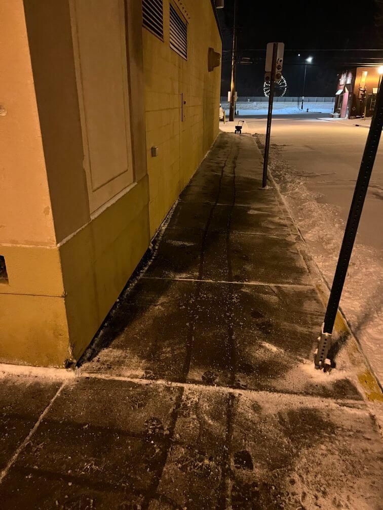 a shoveled and salted walkway