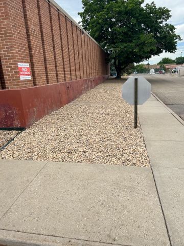 a newly hardscaped business landscape edge