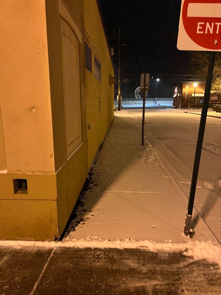a before image of a snowy walkway