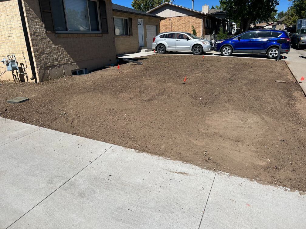 a cleared and prepared yard, ready for sod
