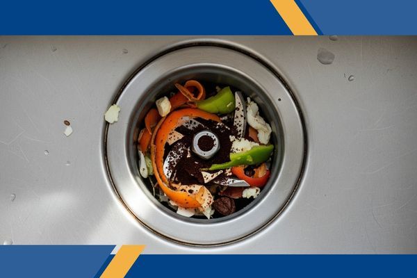 Garbage disposal clogged with food Garbage disposal clogged with food