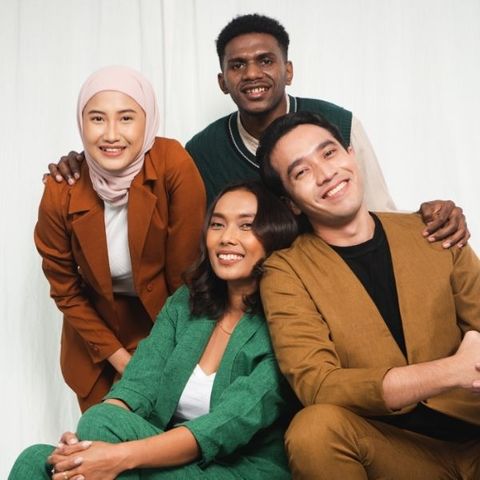 diverse group of people smiling 