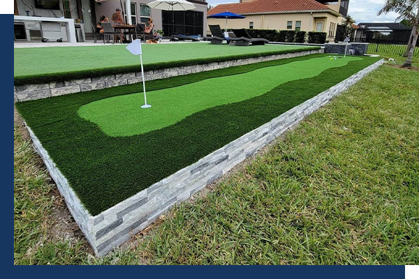 putting green with retaining wall installed by Azevedo's Backyards