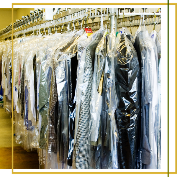 rack of dry cleaning rack of dry cleaning