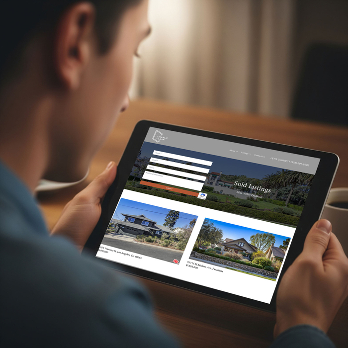 Person using a tablet to view a real estate website