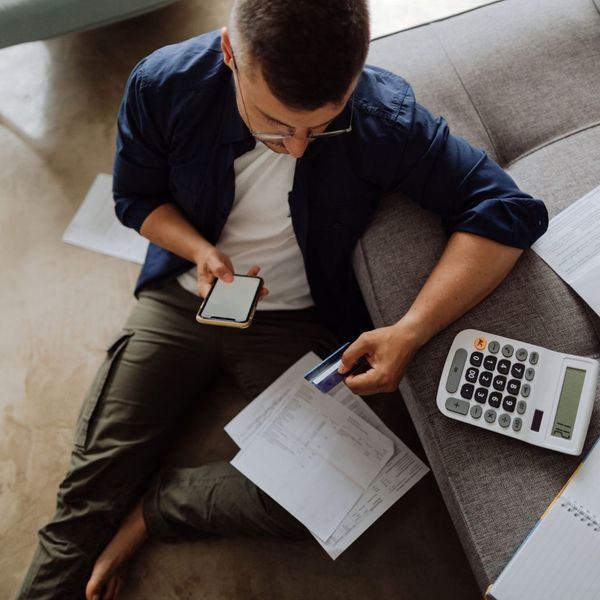 man inputting credit card information