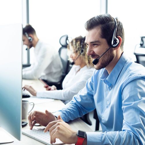 Customer support team talking on a headset