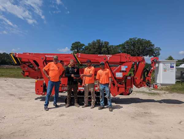 the wood doctor crew with new machine