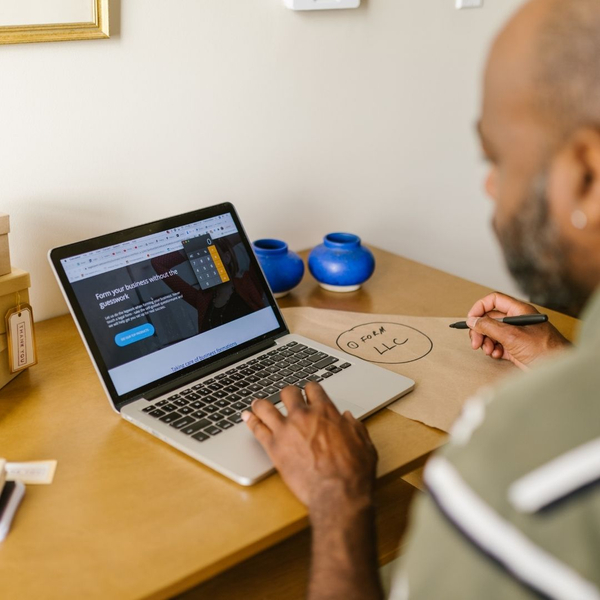 A person using their laptop