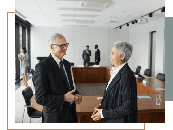 Virginia defense lawyer consulting with a colleague in a law office conference room