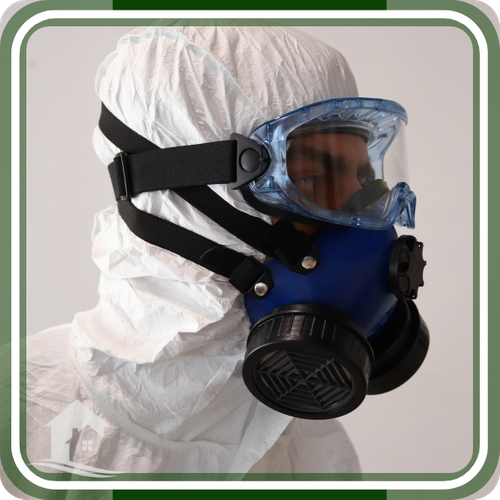 person wearing ppe and face mask