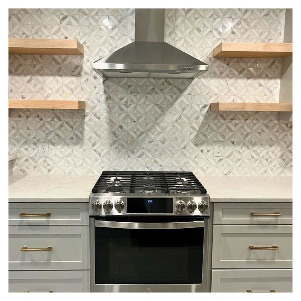 completed stove area by Renata Renovations LLC