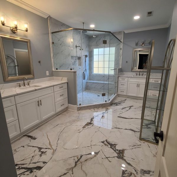 white bathroom with a marble floor