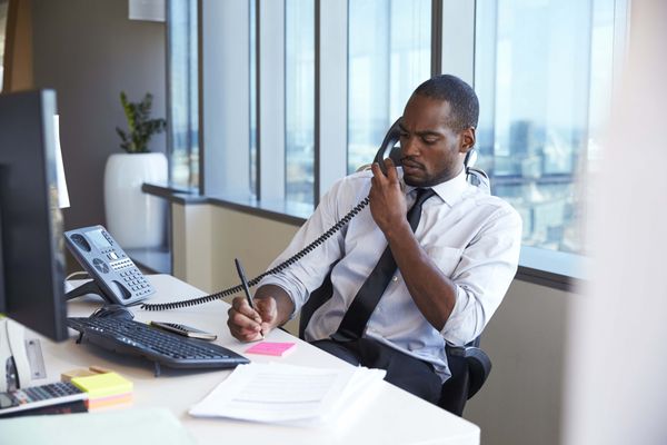 Image of a business man on the phone