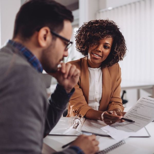 business people discussing assets