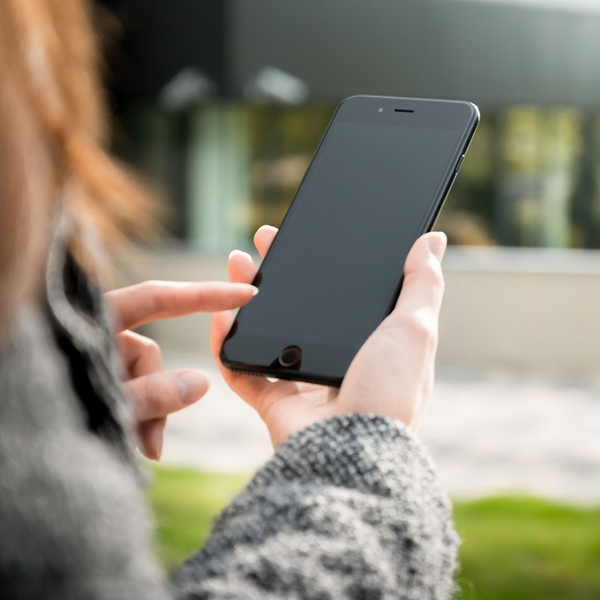 woman using phone to call
