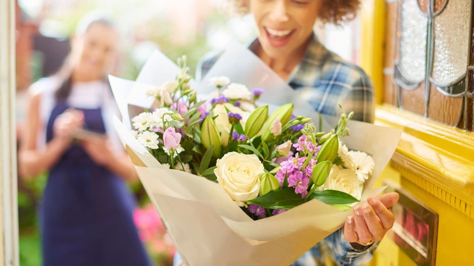 person receiving flower delivery