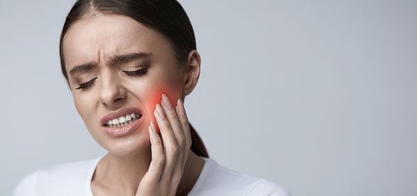 Image of a woman with a toothache