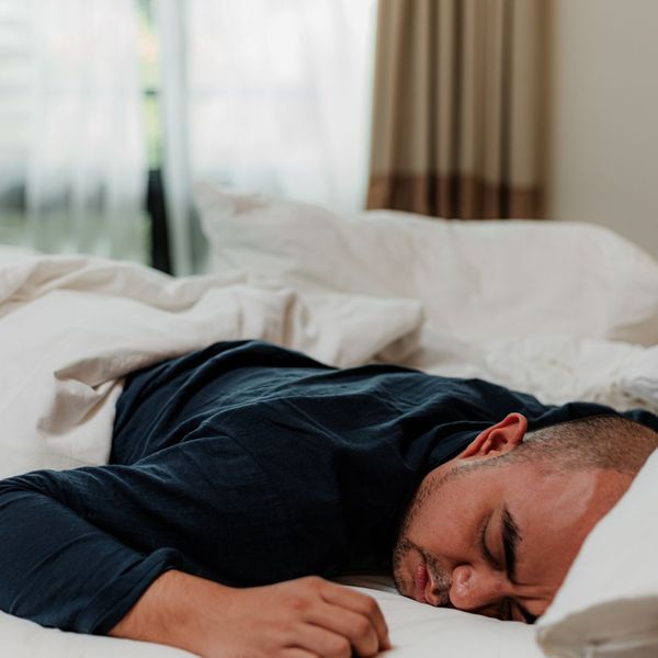 man lying in bed