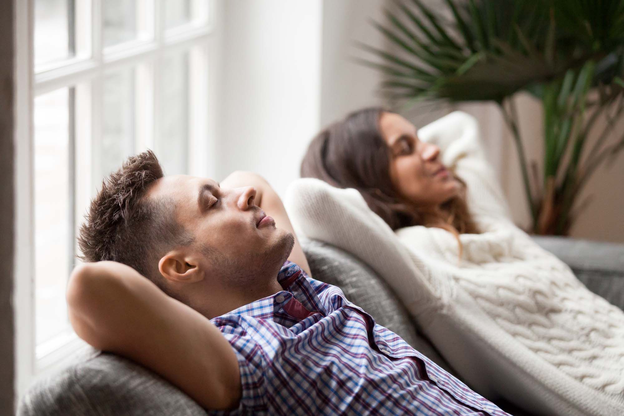 couple on couch breathing