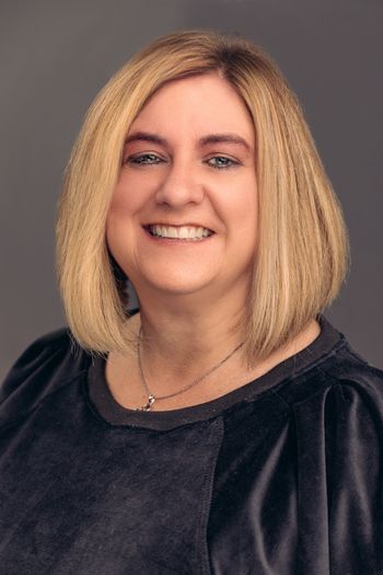 woman with short blond hair smiling woman with short blond hair smiling
