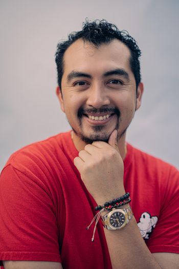 man with goatee and red tshirt man with goatee and red tshirt