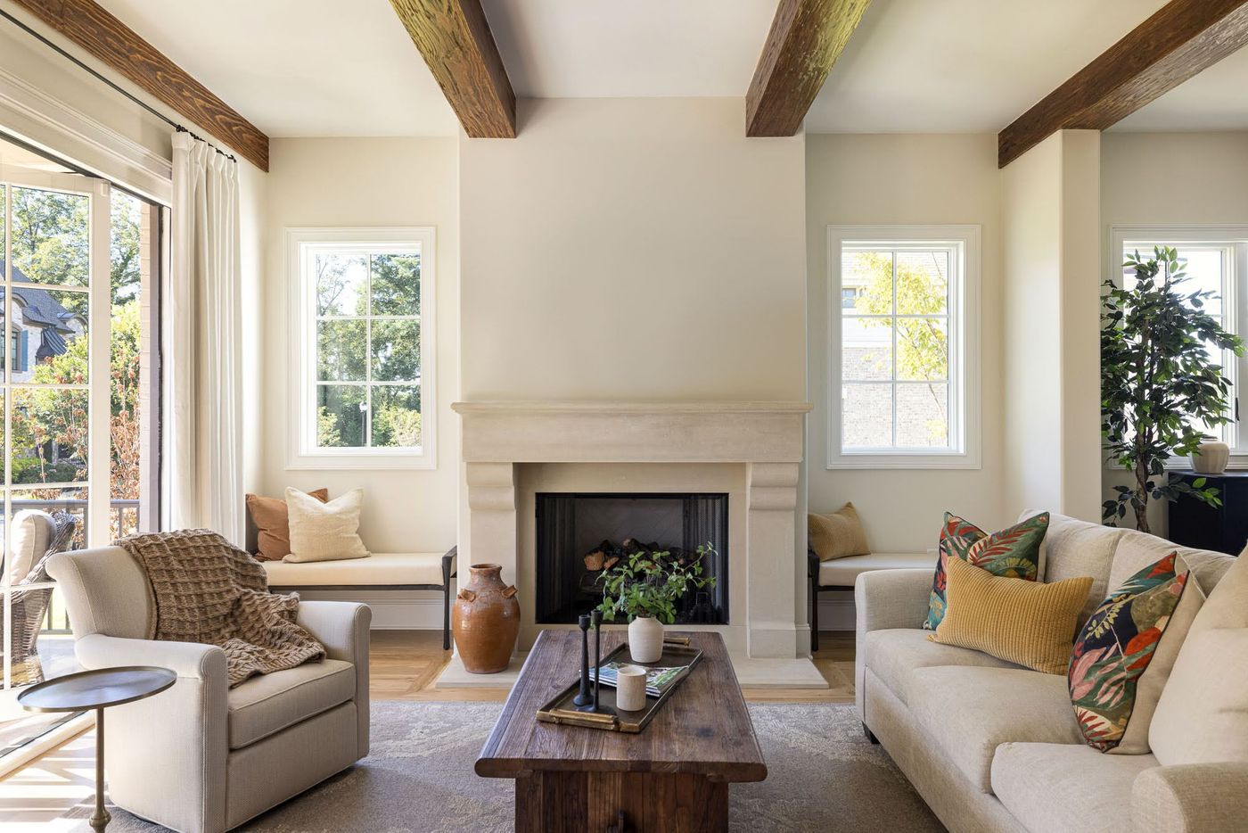 living area with wooden beams 