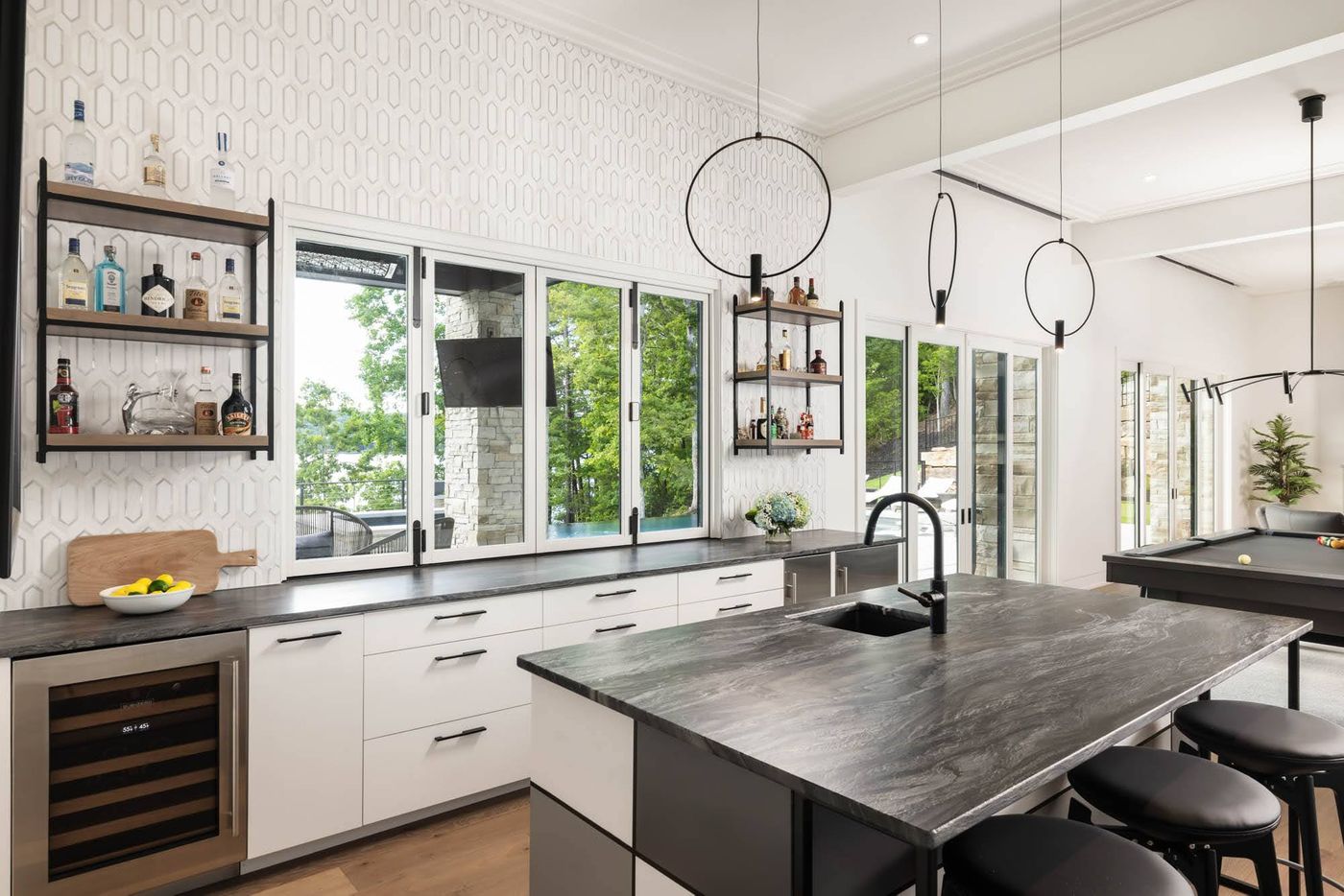 kitchen with dark island and design 