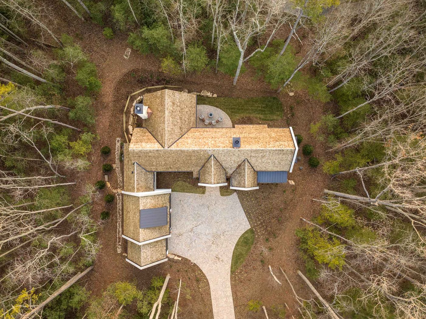 drone view of property in woods 