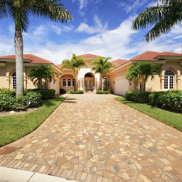 Freshly installed pavers in a driveway.