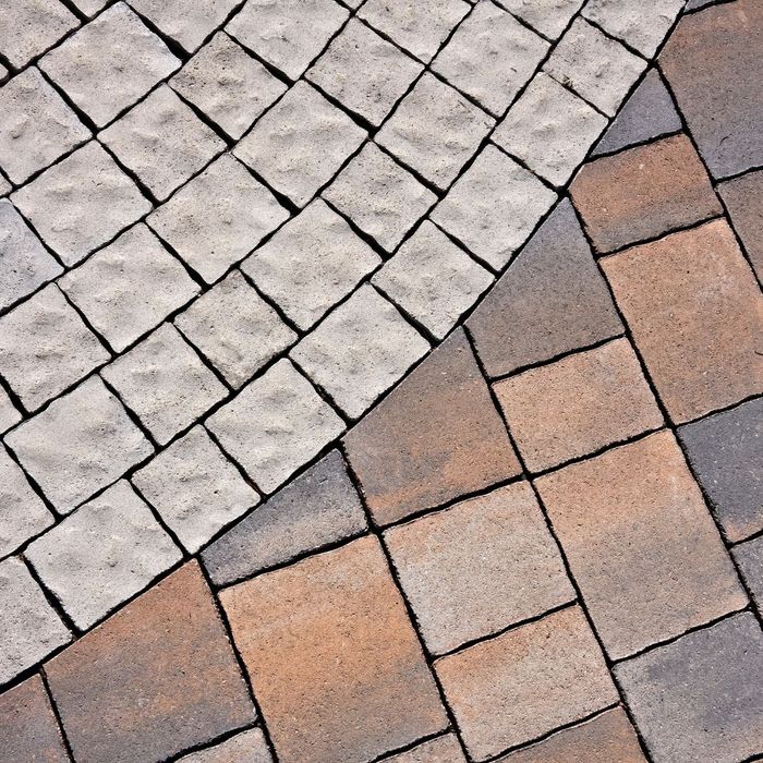Two types of pavers arranged in a pattern.