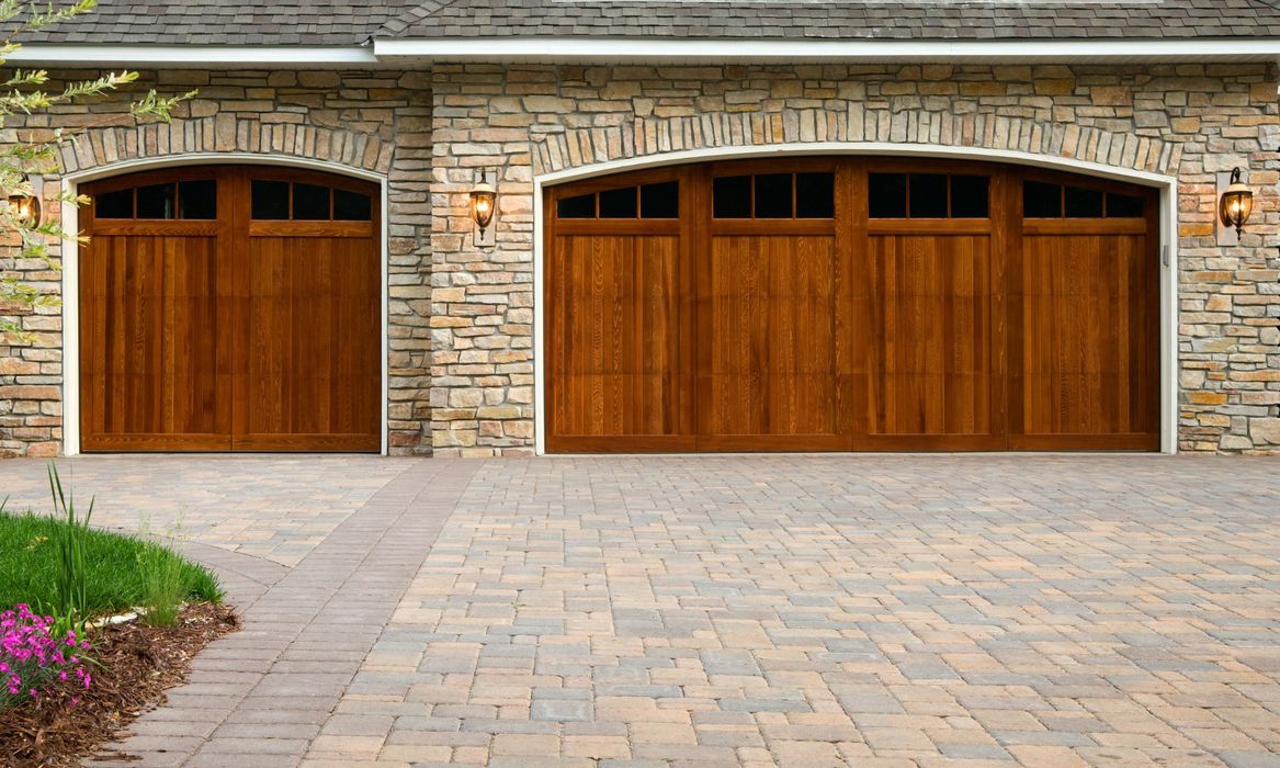 luxury home with paver driveway