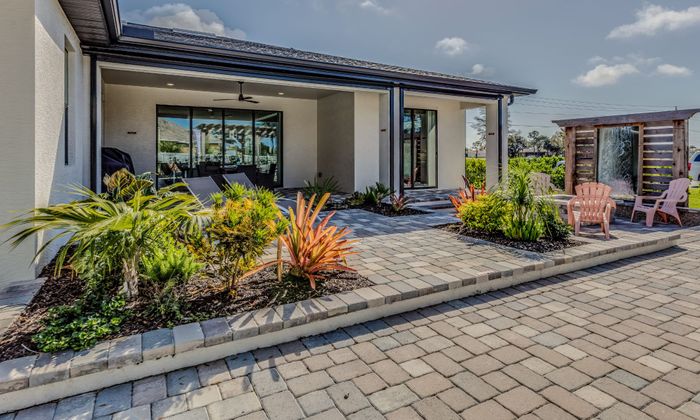 luxury home with paver patio