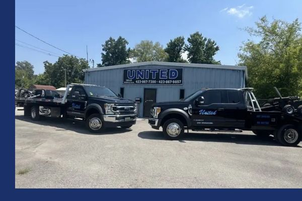 United Wrecker & Transport flatbed and tow truck