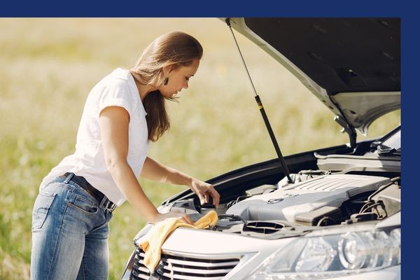 Woman having car trouble