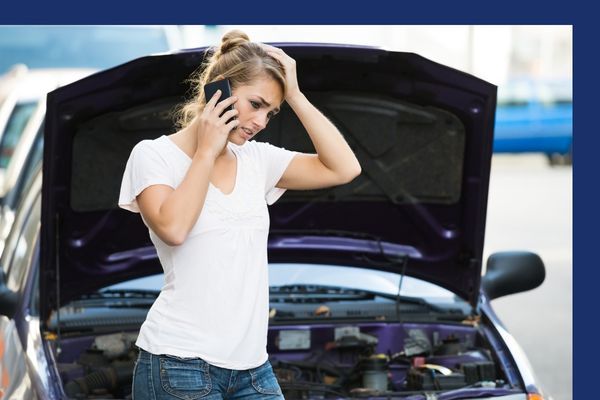 Woman calling for a tow