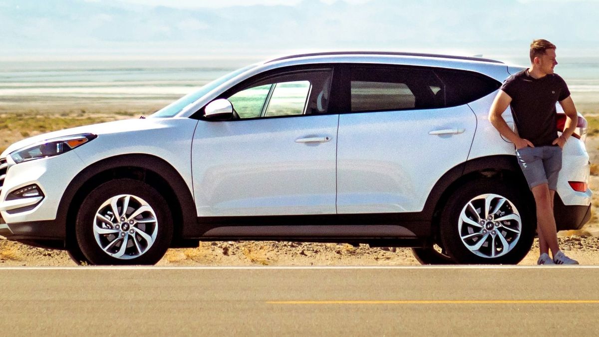 A man stranded on the side of the road