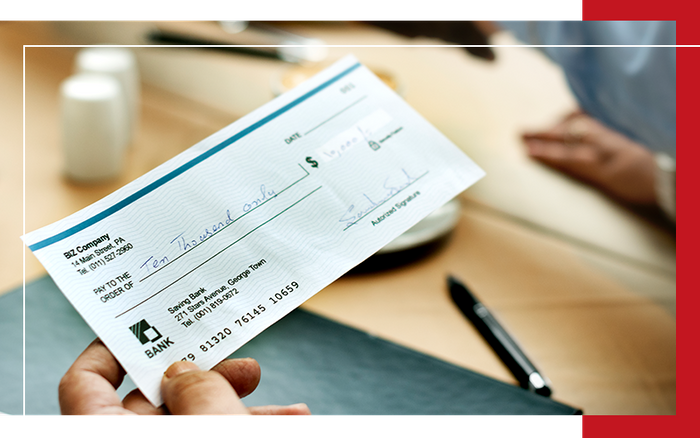 image of a cheque being written