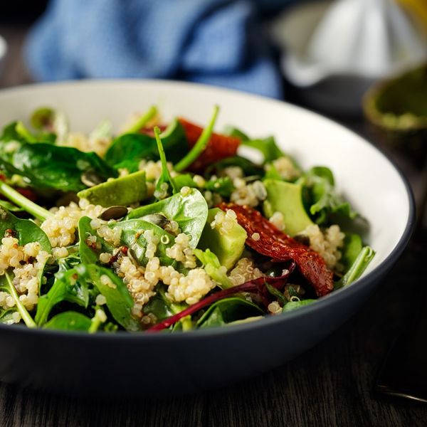 Healthy vegan quinoa spinach salad
