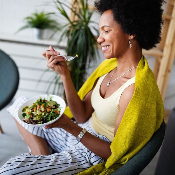 A woman enjoying a healthy meal