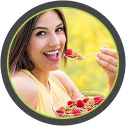 Image of a young woman eating healthy food